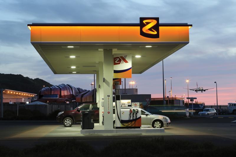 Gas station at night, named Z with orange colors.