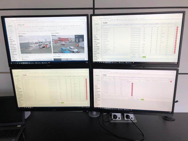 Four computer screens monitoring through the Adam software.