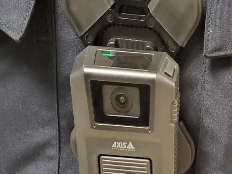 Close up of body worn cam and clip on officers chest