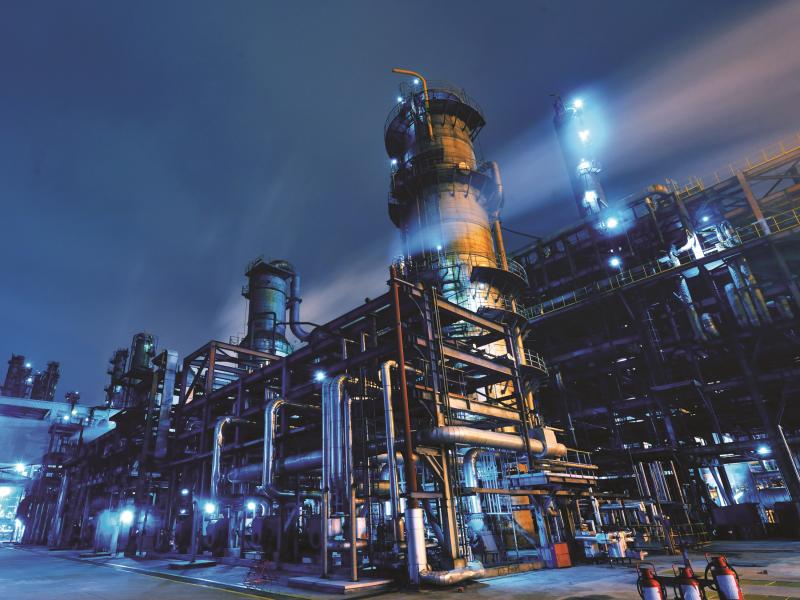 Oil refinery plant at night