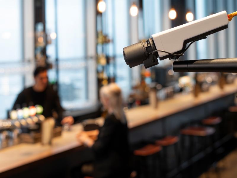 Camera located in restaurant near bar