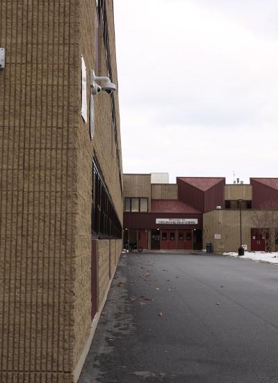 Exterior of Chelmsford High School with cameras on side of building