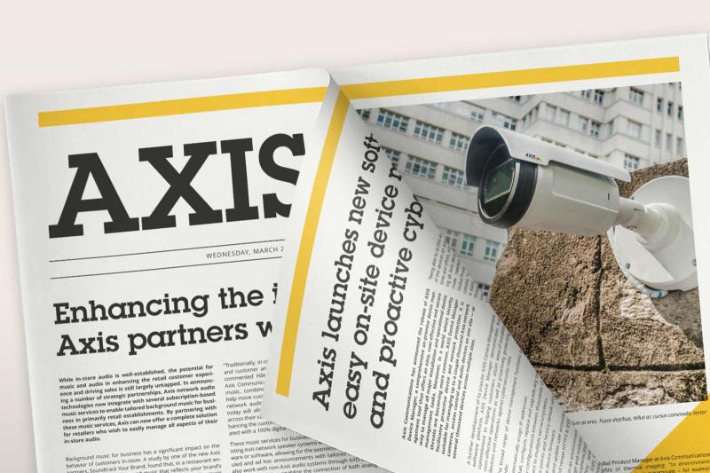 Axis newspaper with articles about cameras