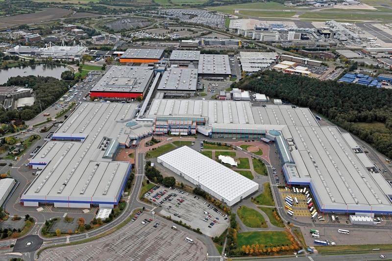 Aerial view of large grey buildings connected with each other.