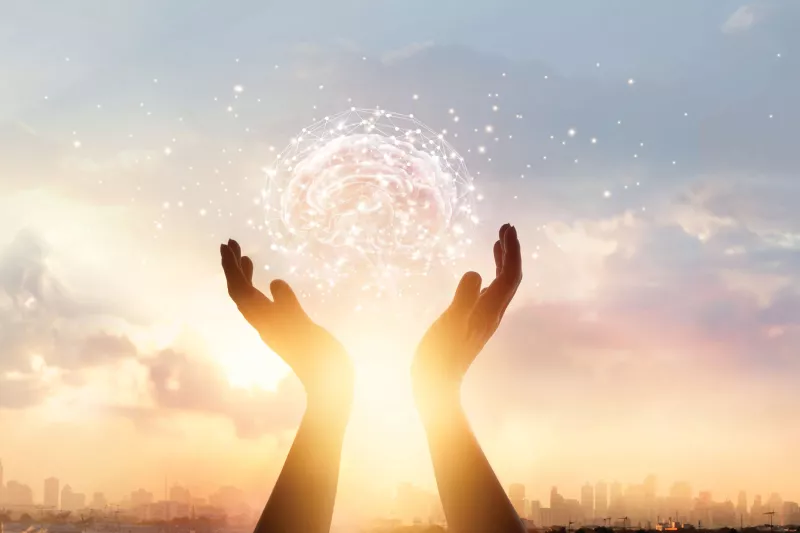 hands_holding_futuristic_tech_brain