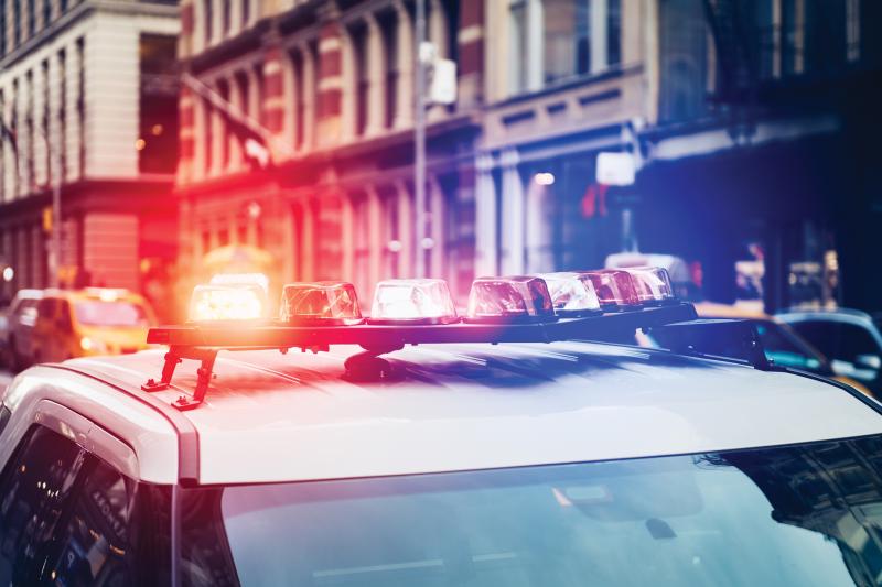 Police car with blue and red ligth on