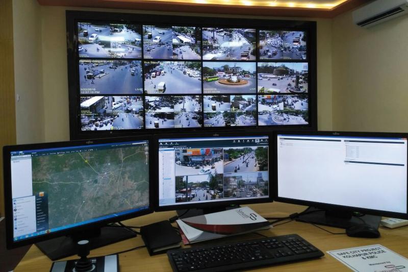 Monitors showing video footage from security cameras