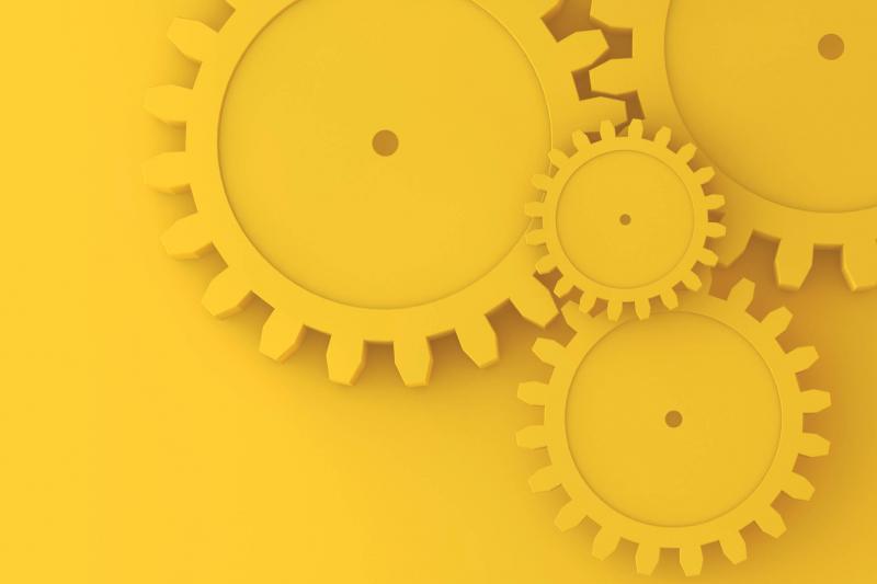 wheels in different sizes in a yellow color on a yellow background