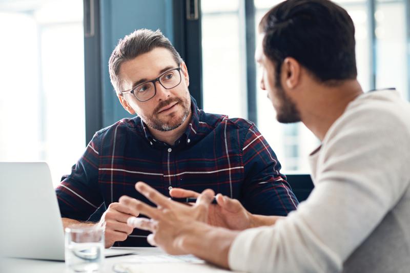 two men having a discussion