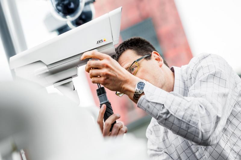 A man fixing a camera