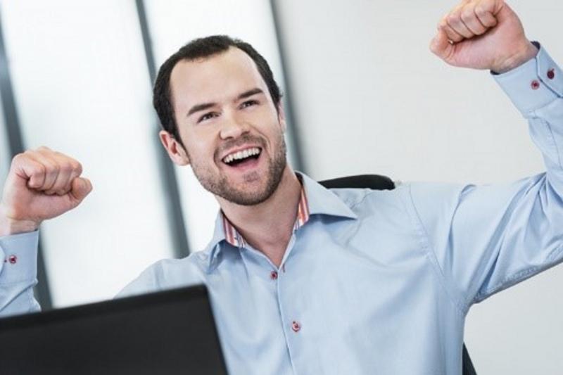 Happy man in a celebration pose