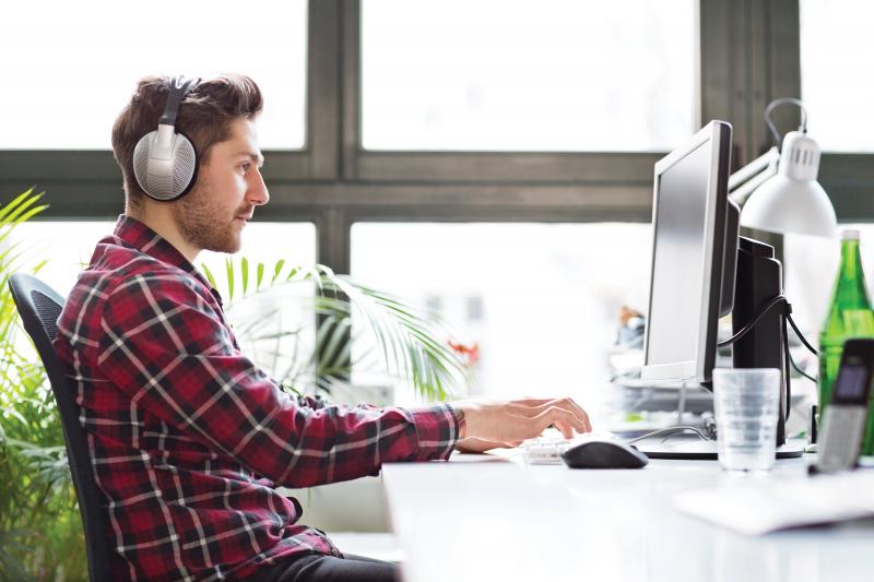 Man studying by computer