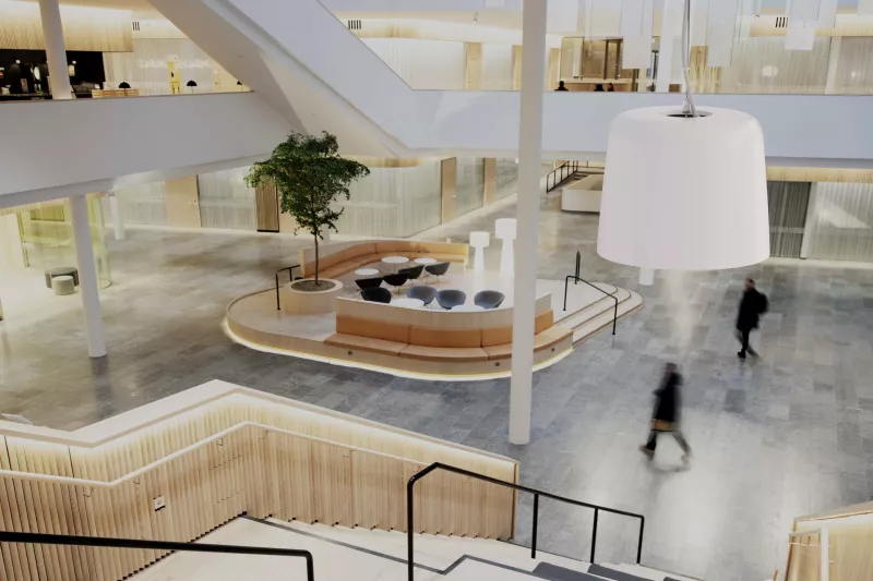 AXIS C1510 Network Pendant Speaker, mounted in a lobby in an office environment