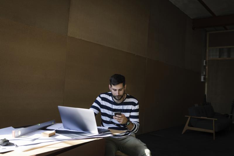 man working on his laptop