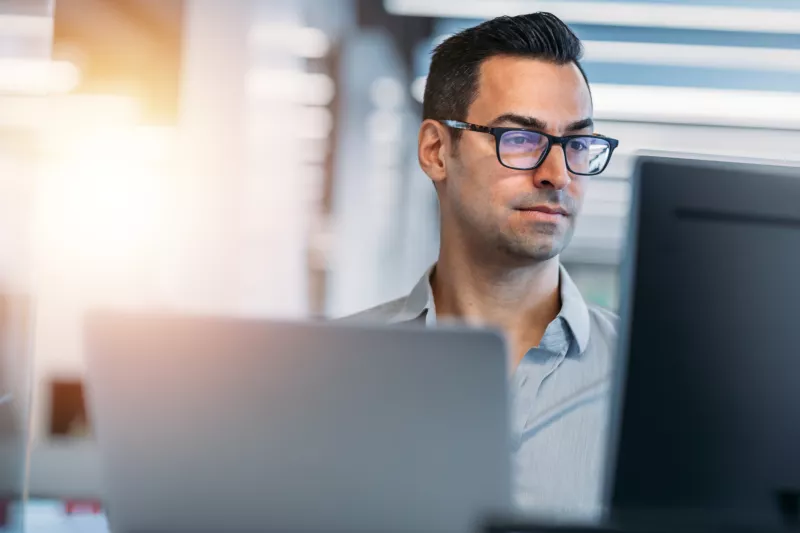 Business man working desktop computer office