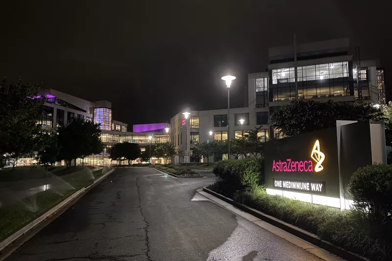 Exterior of AstraZeneca lit up at night 