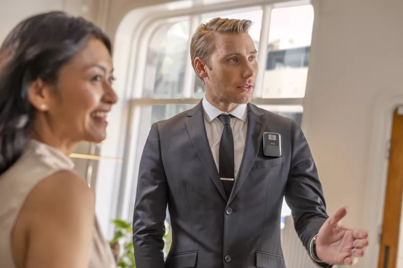 security guard and female staff in retail store