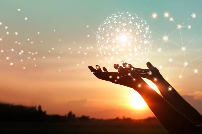 hands holding global networks connection symbolizing managed services