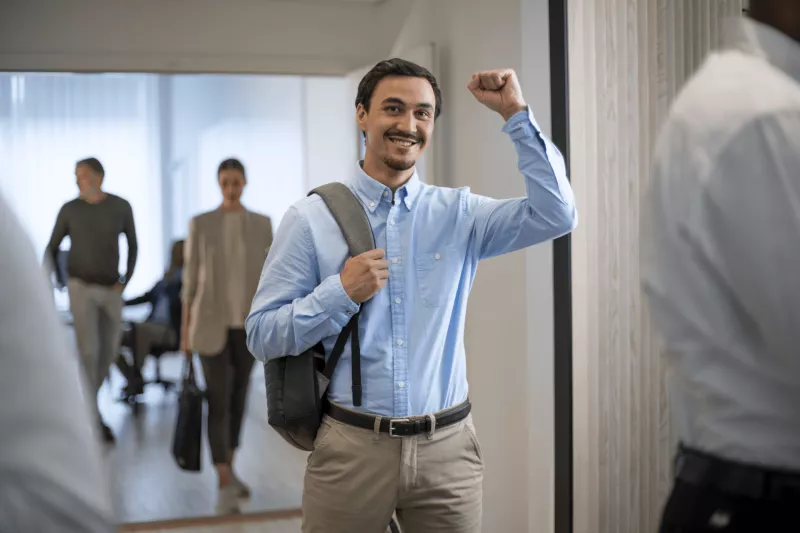 Man celebrates passing certification test