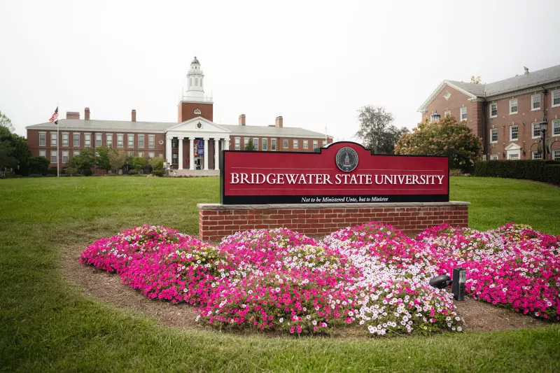 Beauty shot of Bridgewater State University's Boyden Hall with flowers