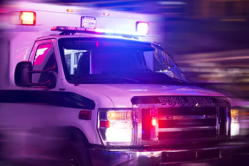 Ambulance with lights at night