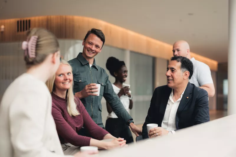 axis colleagues having a fika together