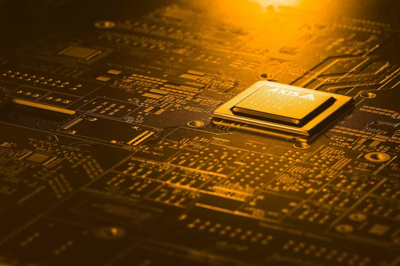 ARTPEC chip in golden light