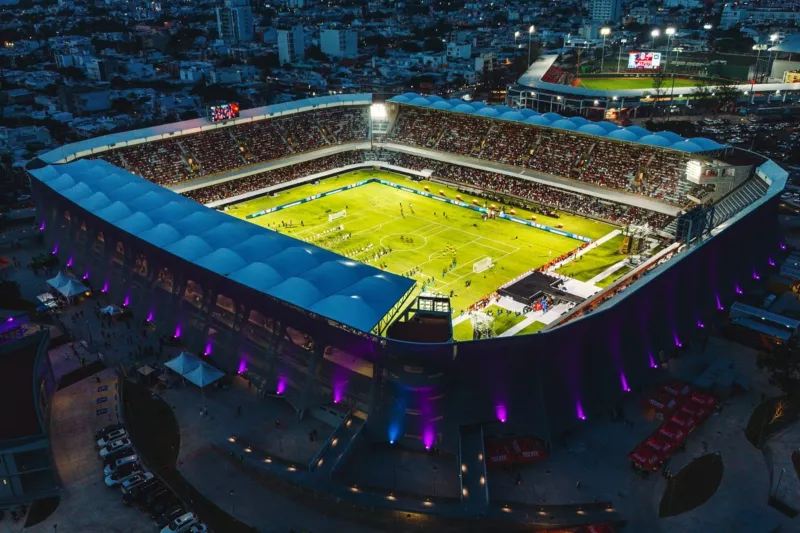 Evening aerial view of football match played at Luis Pirata Fuente Stadium