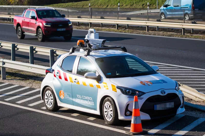 Toll control car equipped with network cameras on the highway.