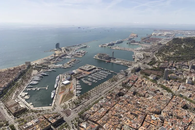 Aerial view of Barcelona's smart port and marina alongside the city skyline Edit media