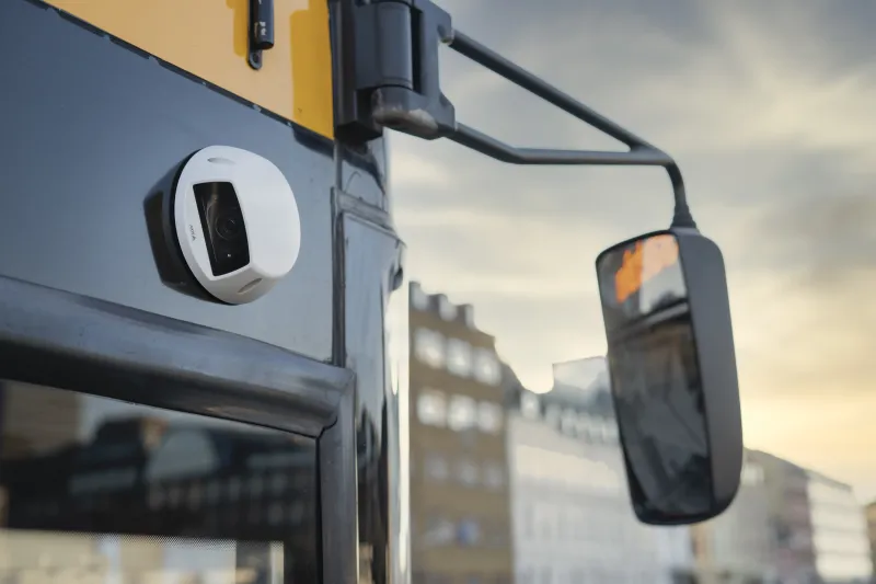 AXIS M3905-R Dome Camera with AXIS TP3826-E Housing, mounted on a bus