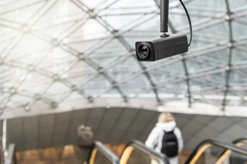 AXIS Q1715 mounted above escalator