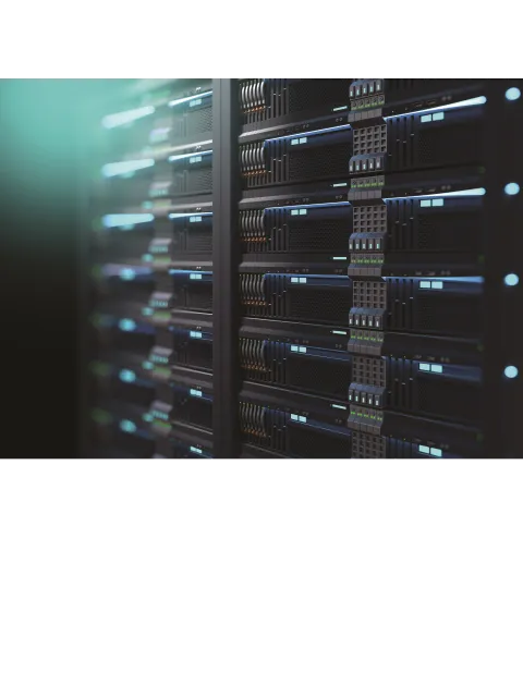 Rack of black servers with blue light.