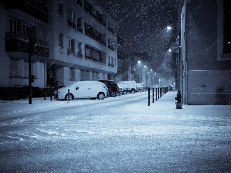 Parking lot in the city a snowy night