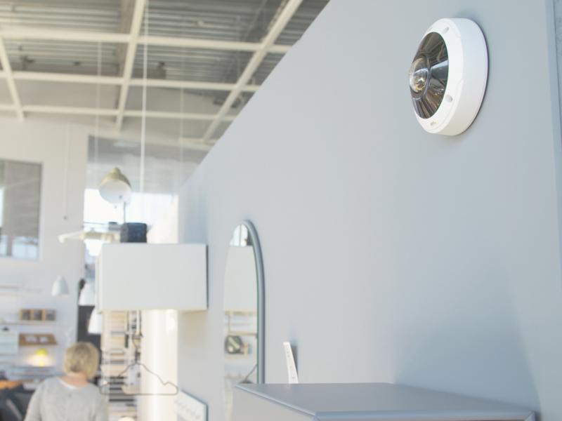 M3058 mounted on wall in furniture store.