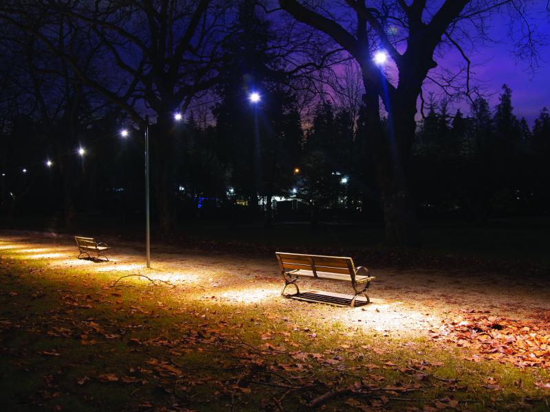 Axis IP camera faced towards a park benches in streetlights