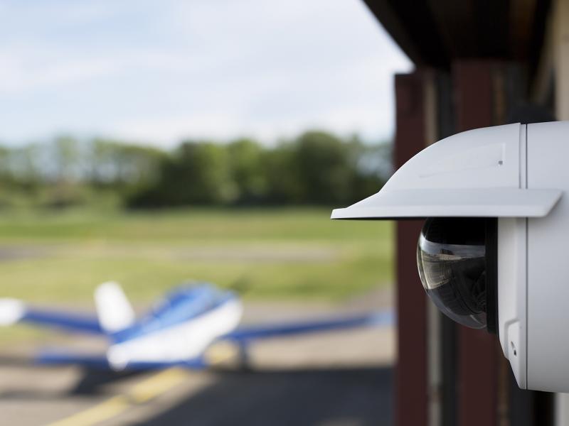 Axis IP camera viewed from a airplane outdoor hangar