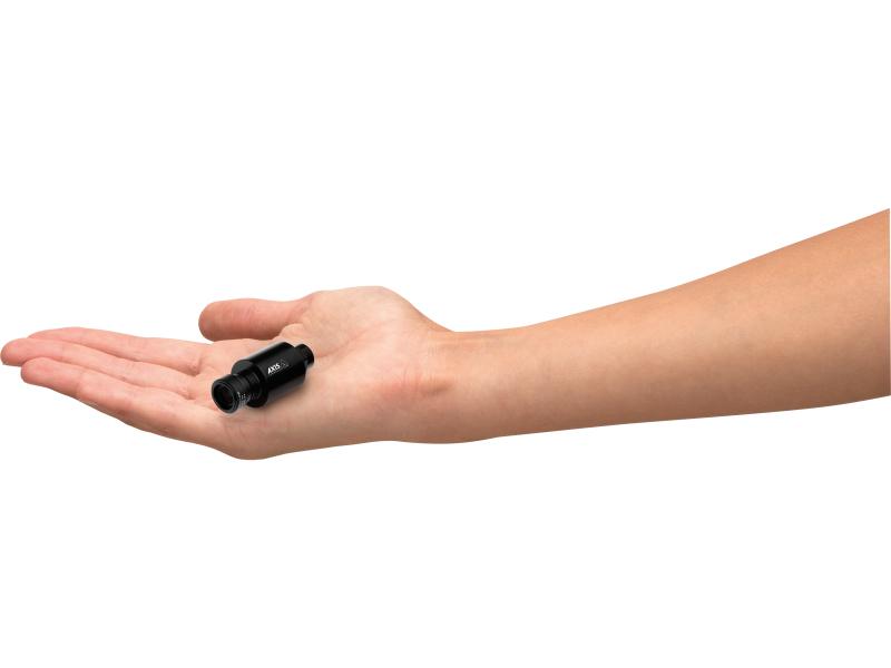 a hand holding a AXIS F1015 Sensor Unit