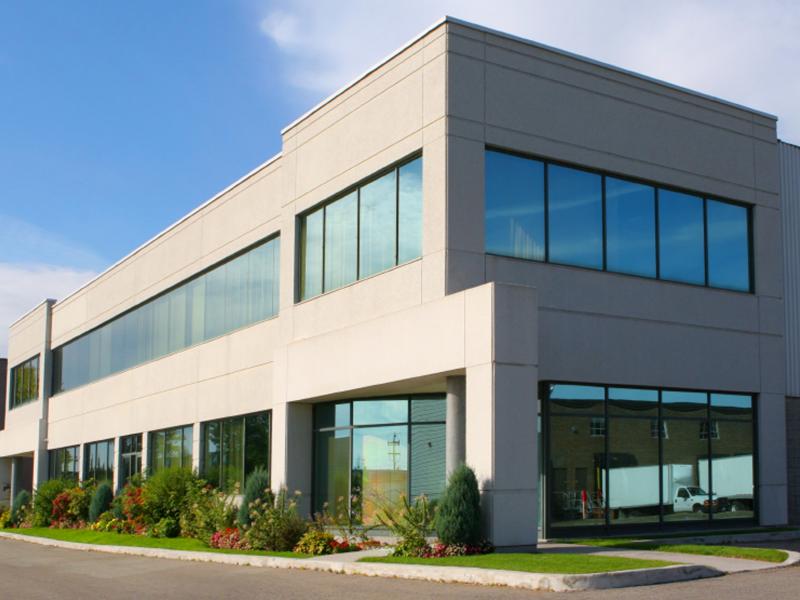 A building with concrete and glass facade