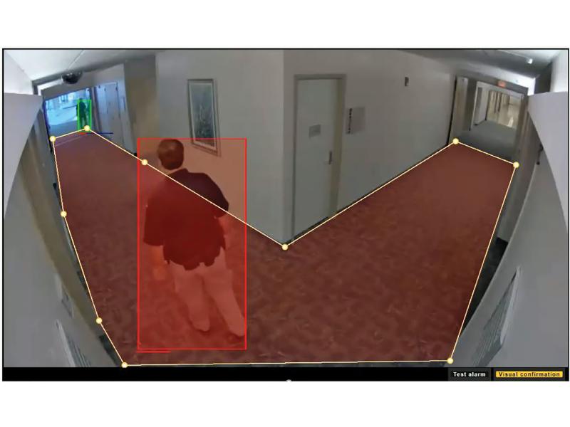 Axis loitering detection viewing a man and marking corridor red.