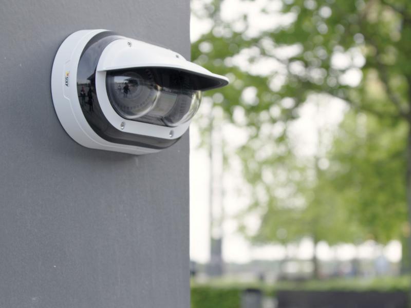 AXIS P3715-PLVE Network Camera mounted on wall outdoors