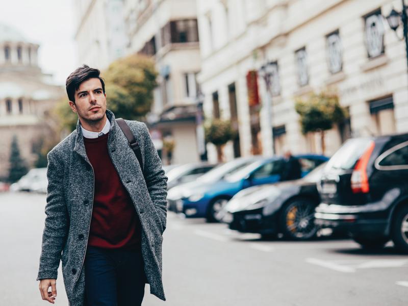 Man walking along street in a city