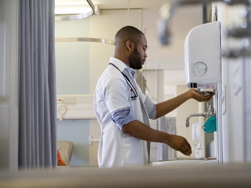 healthcare worker washing hands