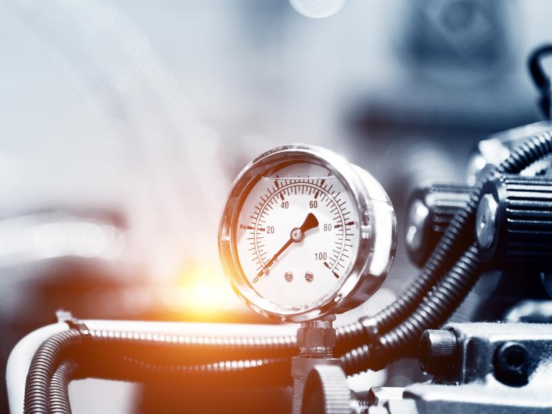 Industrial pipes and a pressure gauge with dial valves