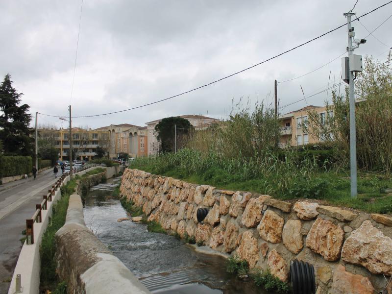 Roadside ditch water running in Metropole Toulon, France