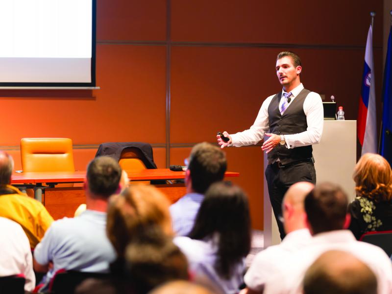 Man speaking in front of audience