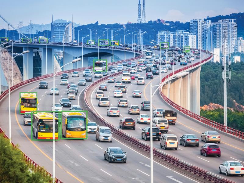 Busy bridge with several vehicles