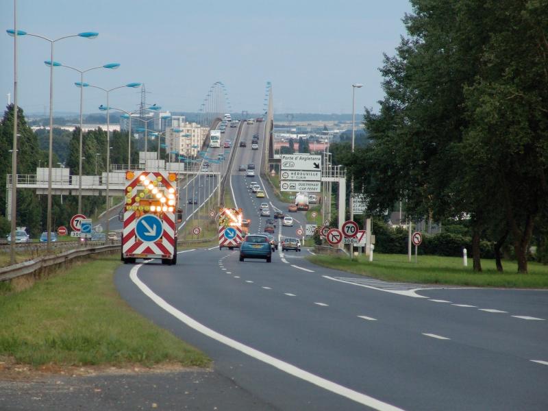 Roadwork at a street before a bridge
