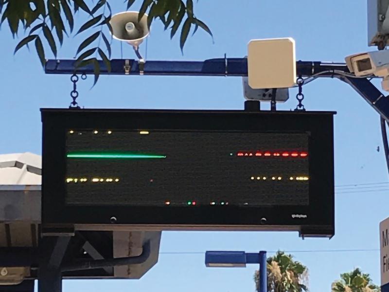 Digital pole sign with network camera and horn speaker mounted on the side