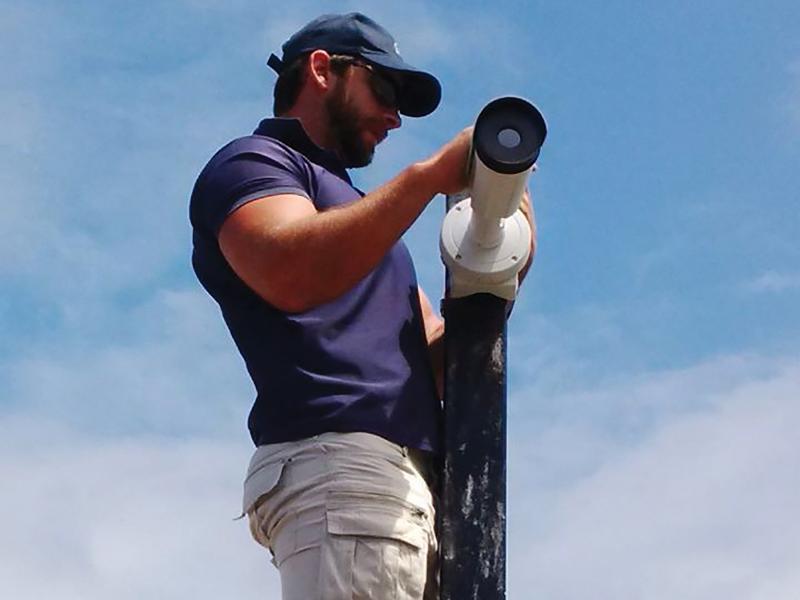 Man installing camera